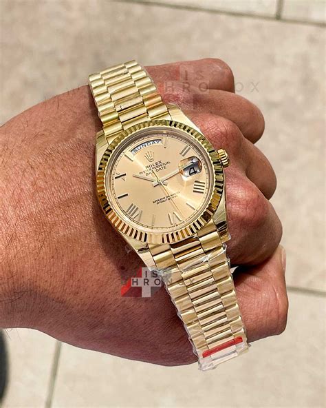rolex day date 40 yellow gold on wrist